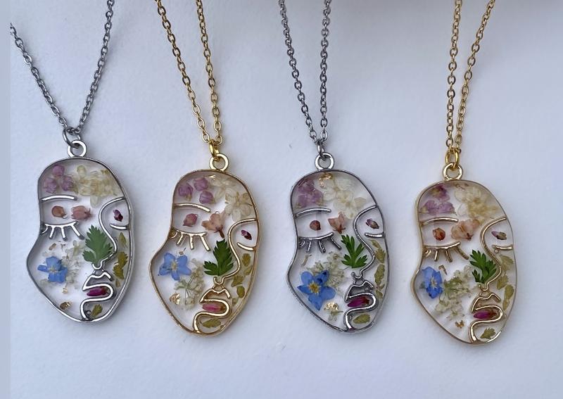 Abstract face floral pendant
