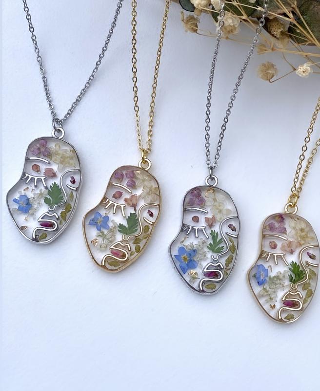 Abstract face floral pendant