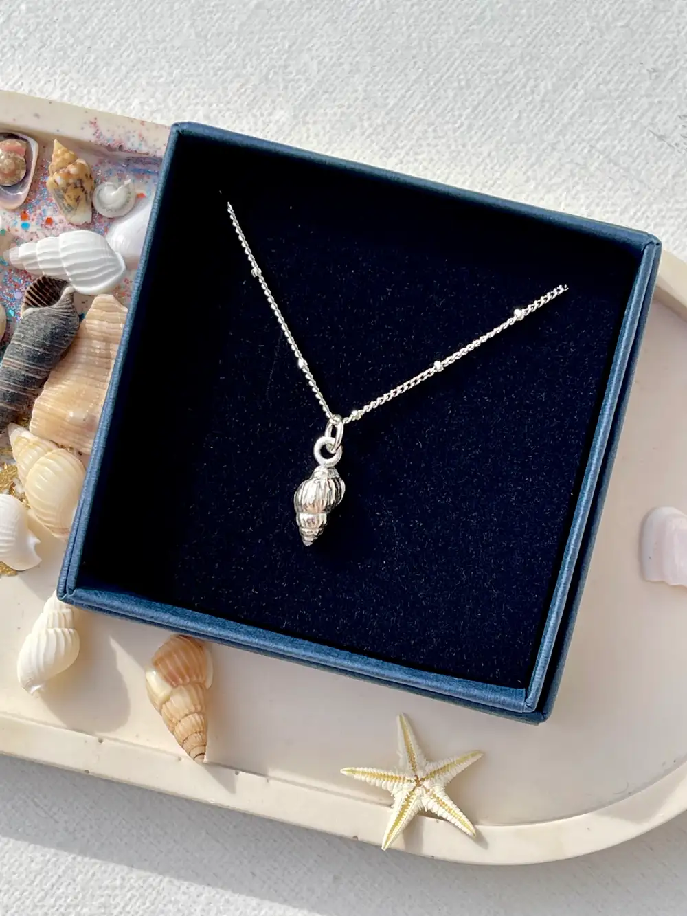 Dainty Silver Whelk Shell Necklace